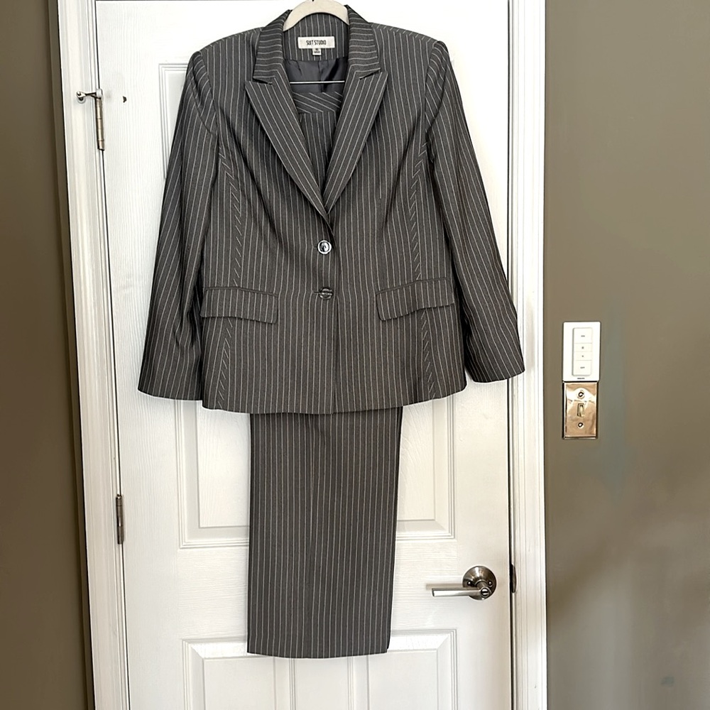 Pinstripe pants suit.